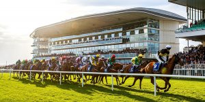 Jockeys on horses mid-race