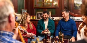 Friends drinking in a pub